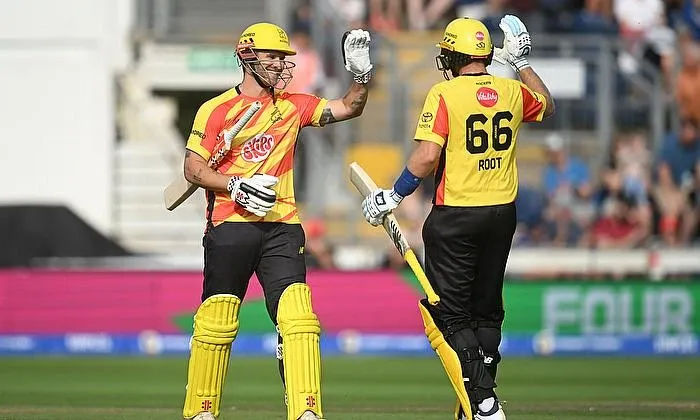 joe-root-and-sam-hain-of-trent-rockets-celebrate-victory.webp